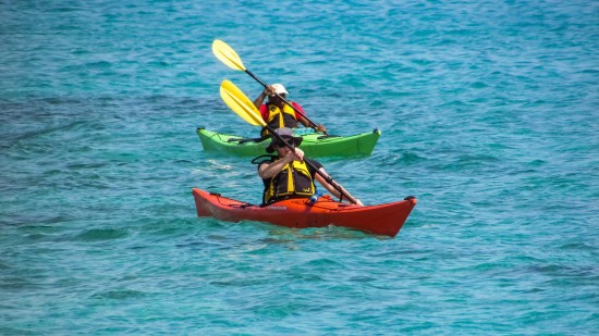 kayakers battling to go ahead in a river in Chikmagalur