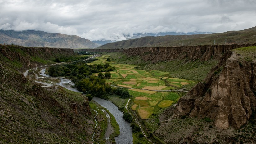 a panoramic view of a hill station during monsoon