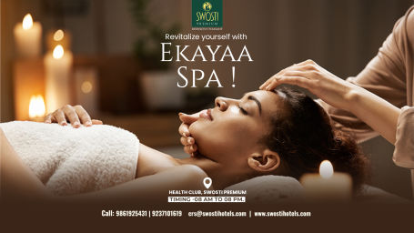 Ekayaa - The Spa at Swosti Premium poster featuring a woman reclining on a bed while another woman gives her a head massage.