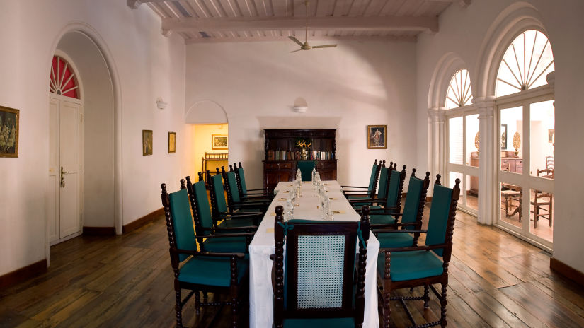 The Tower House - A conference setting in the grand hall of the Tower House with large entrance doors 2