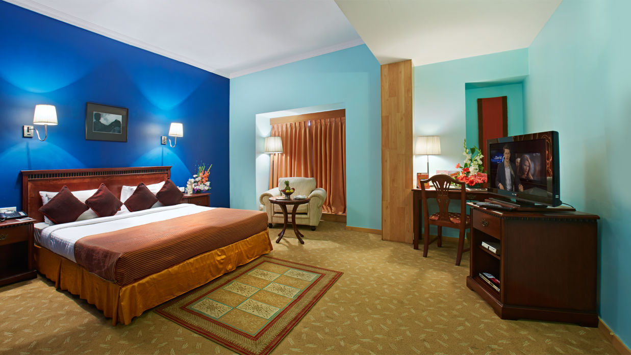 the bedroom of Junior Club Suite