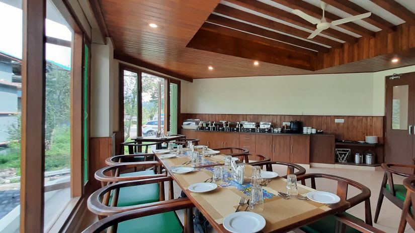 Side-view of the seating area at Verandah restaurant - Mastiff Xanadu, Manali