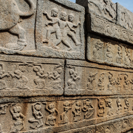 Carvings of dancing girls on the walls of the Mahanavami Dibba