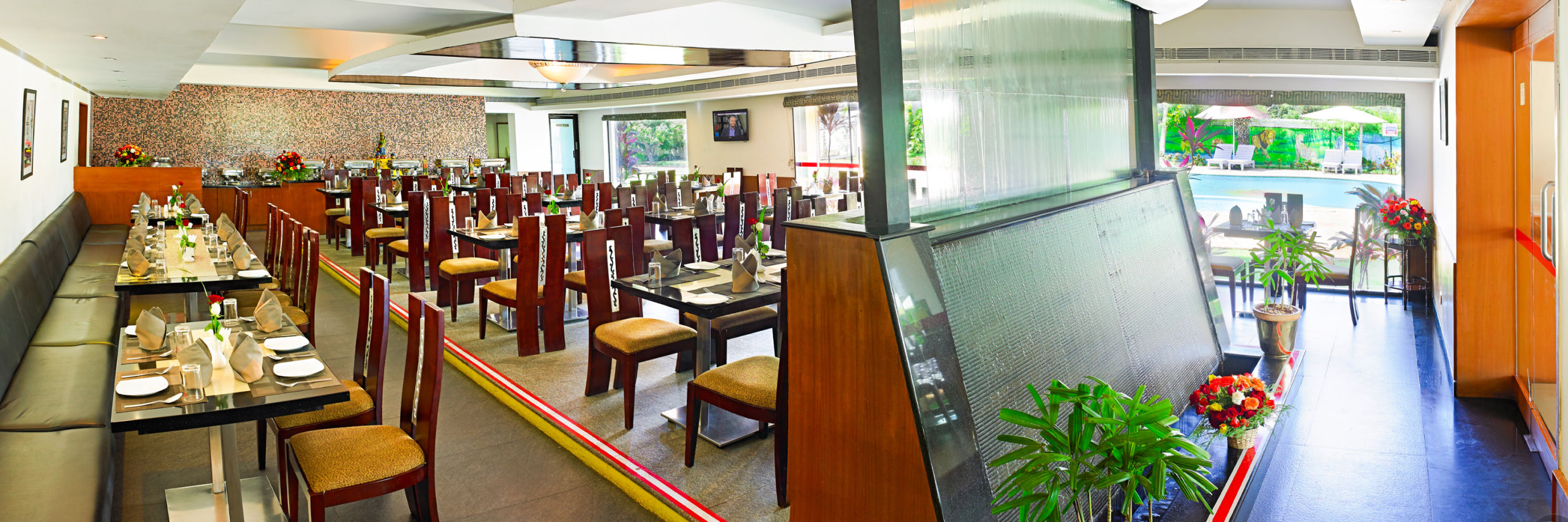 the seating area at the restaurant in Vailankanni 5