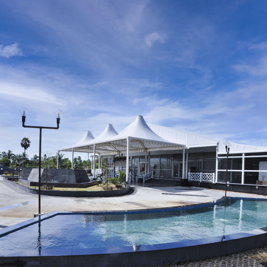 an event space with a swimming pool outside the event venue - MGM Hotels and Resorts