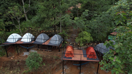 a far out view of the tents at Holistic Stay Eco Resort, Kannur