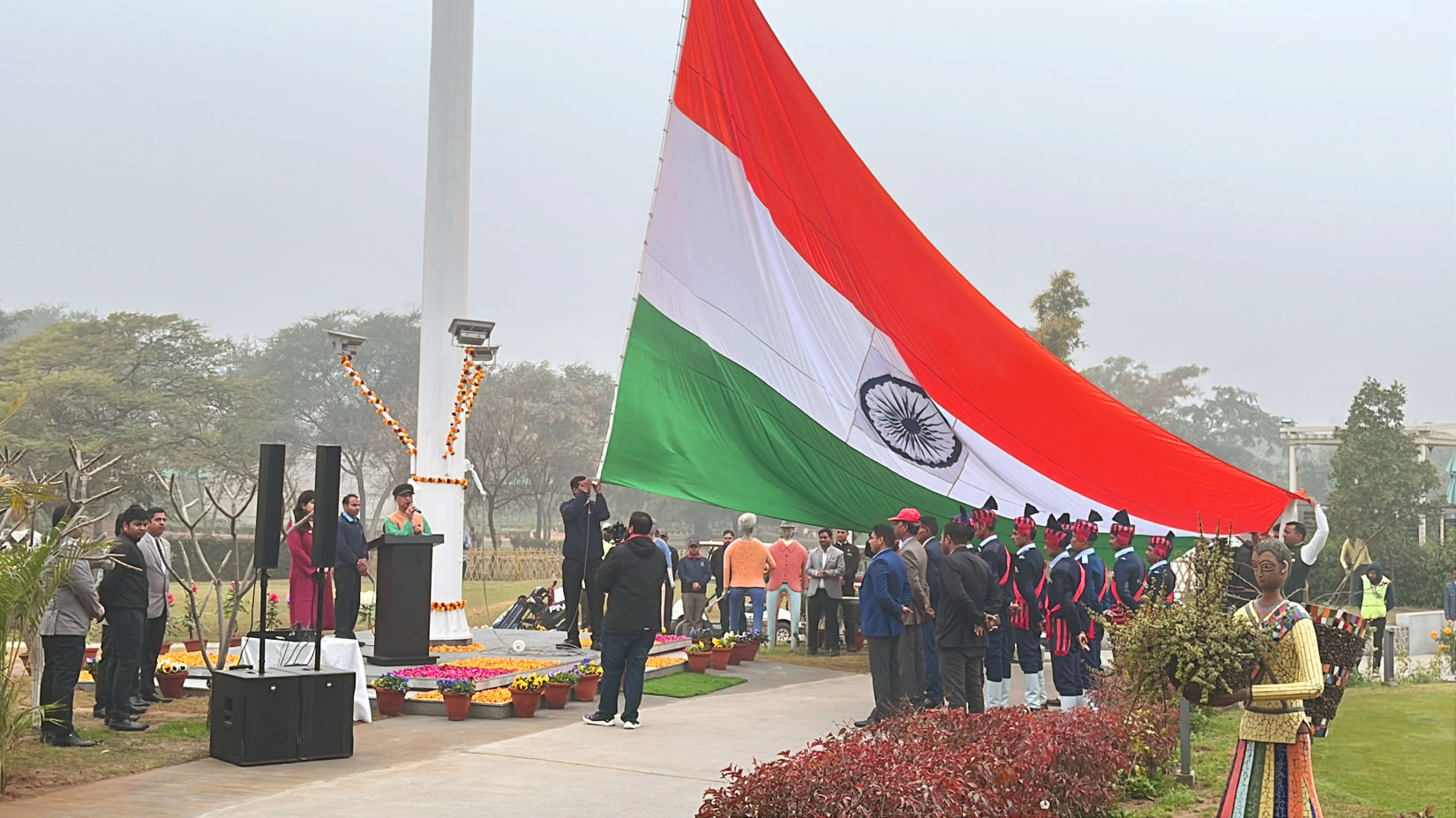 An Indian flag being hoisted during daytime