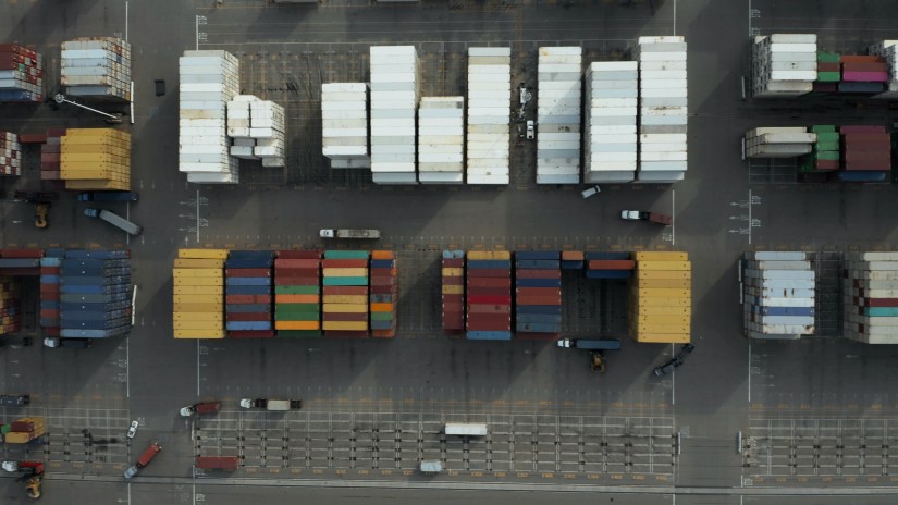 Overhead view of shipping containers neatly line together