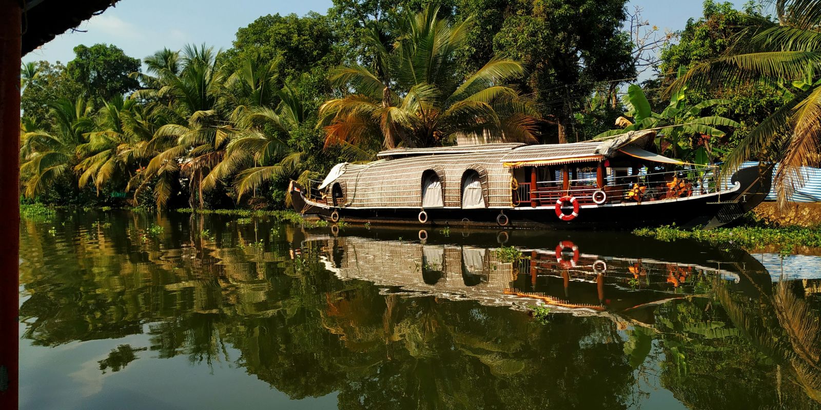 elegant boathouse in Kumarakom captured during the day3