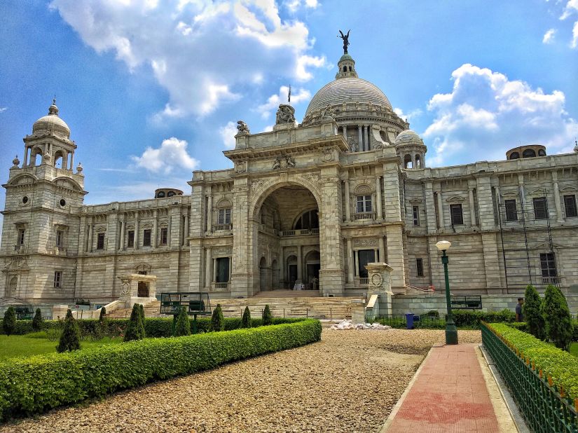 victoria memorial surrounded by lush green lawn