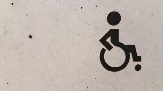 wheelchair sign on a wall