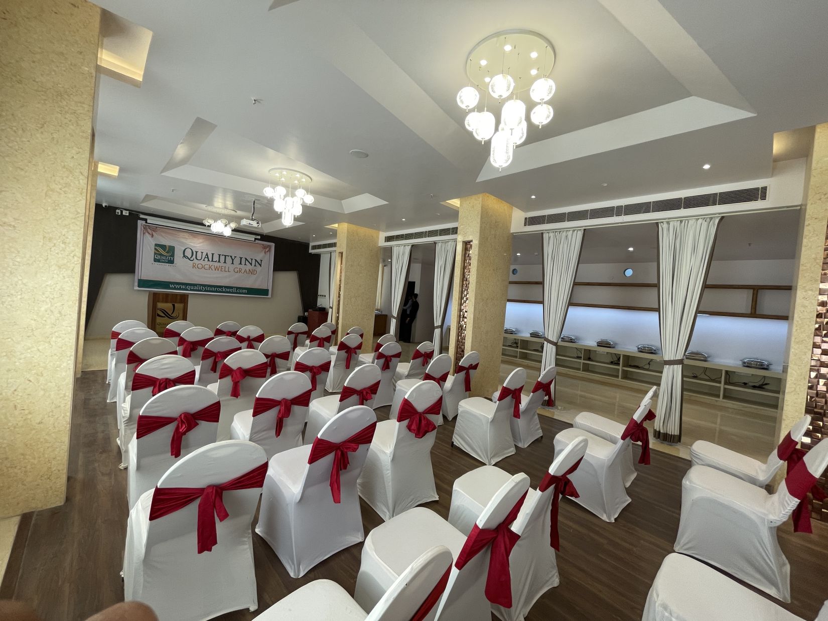 interior view of an event space with theatre style seating and luxurious interiors - Quality Inn Rockwell Grand3