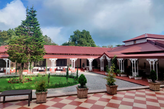 alt-text Facade view of The Claridges Nabha Residence, Mussoorie