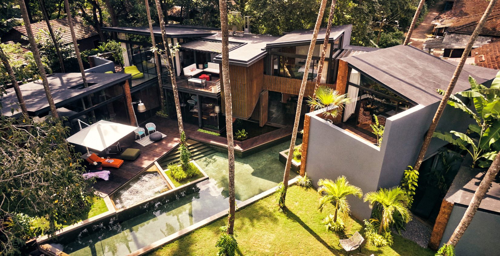 Bird's eye view of the villas with the swimming pool in the centre at villa in palms