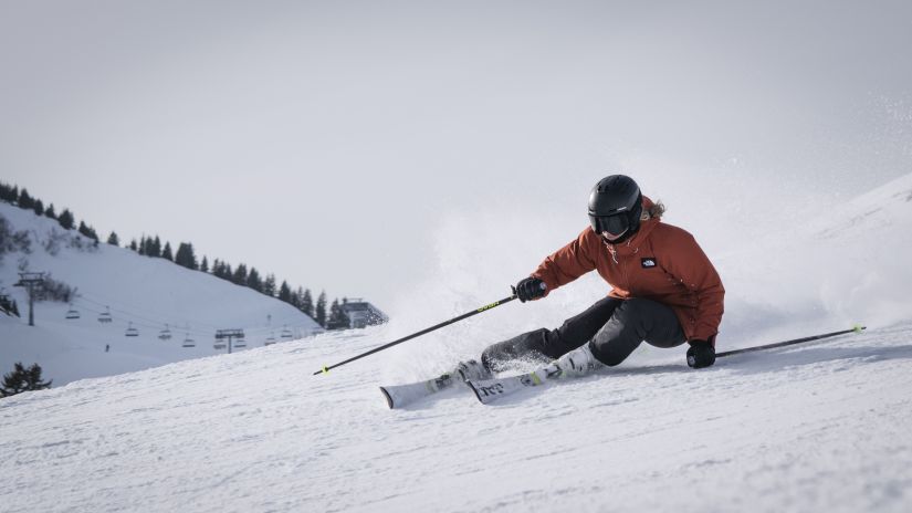 A skier on the snow-capped mountain