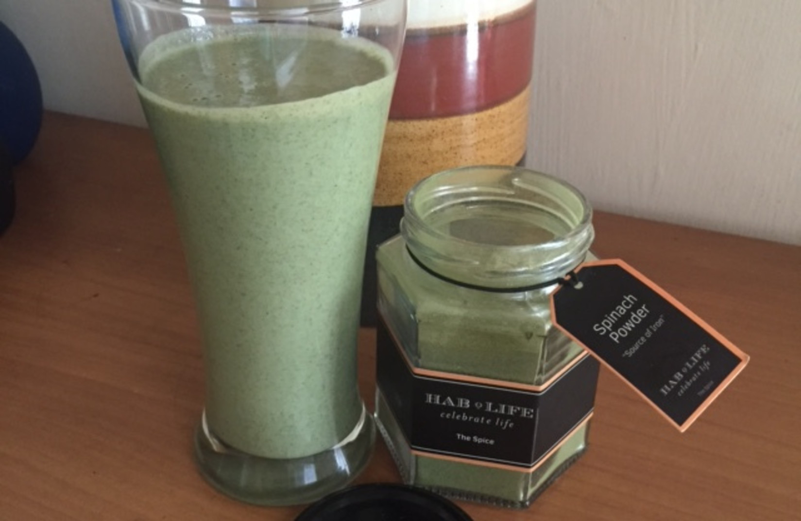 A jar of spinach powder and smoothie at Hablis Hotel, Chennai