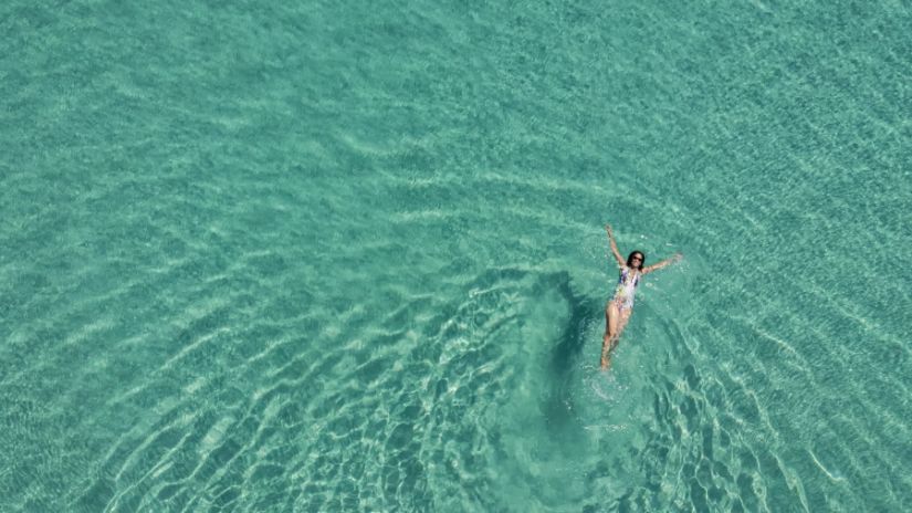 a person floating on water