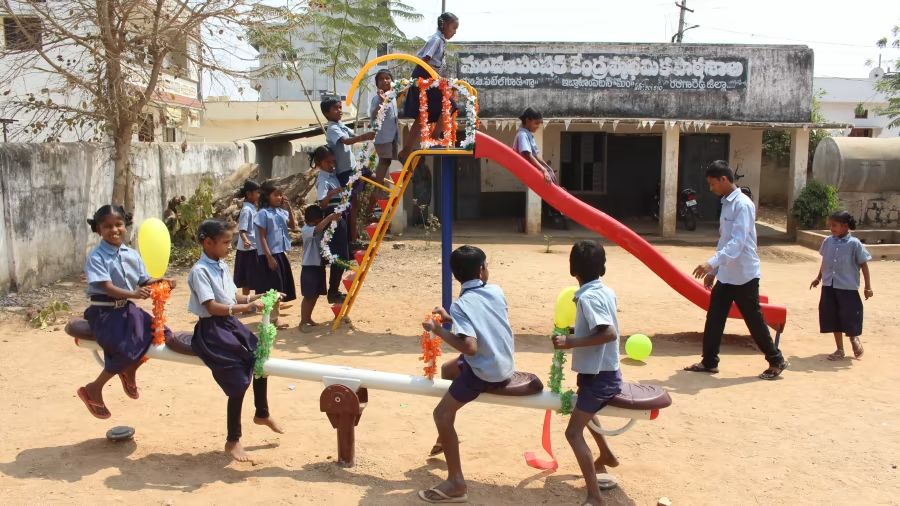 kids riding the seesaw on a playground