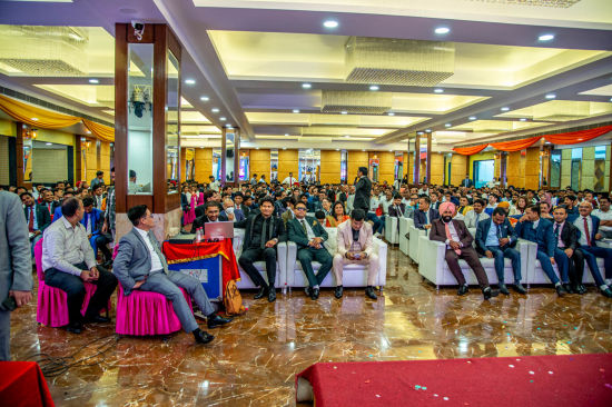 alt-text A front view of a conference hall with multiple chairs occupied by poeple Sun Park Hotel & Banquet, Chandigarh - Zirakpur