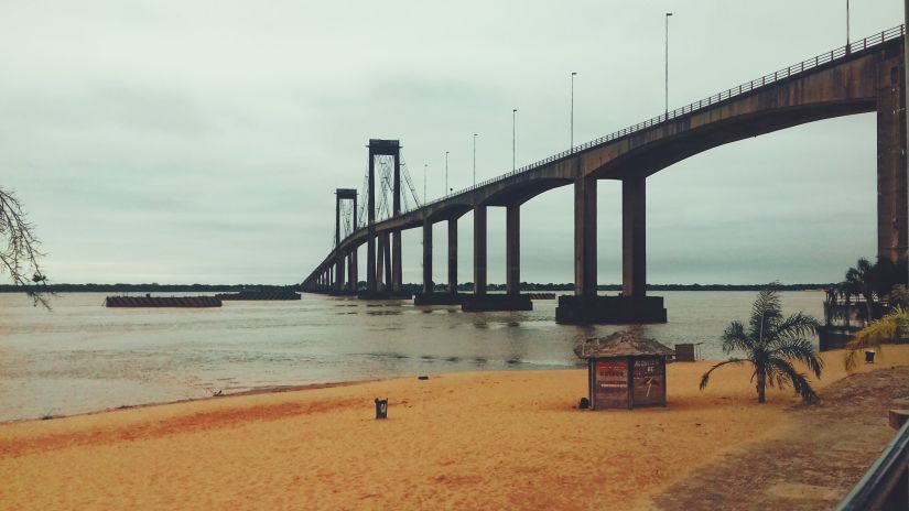 Bridge in South Goa with sandy beach below