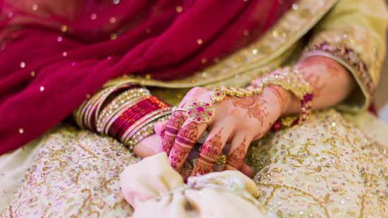 a close up shot of the brides hands