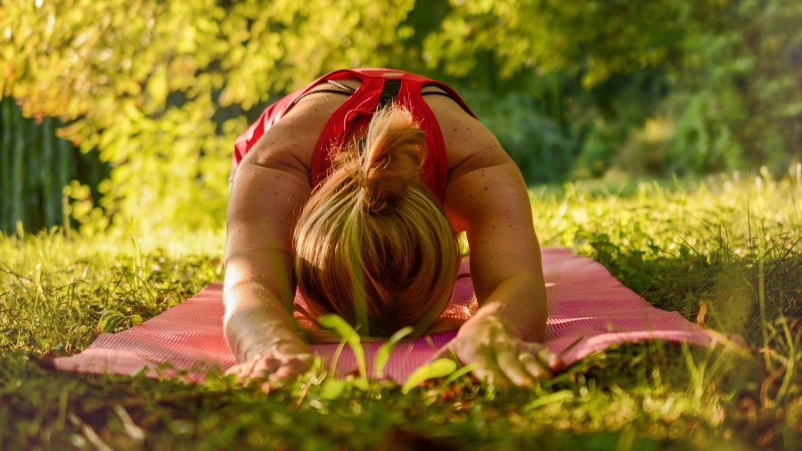 a lady doing yoga