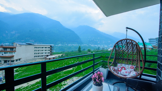 hanging chair in the balcony of one of our rooms