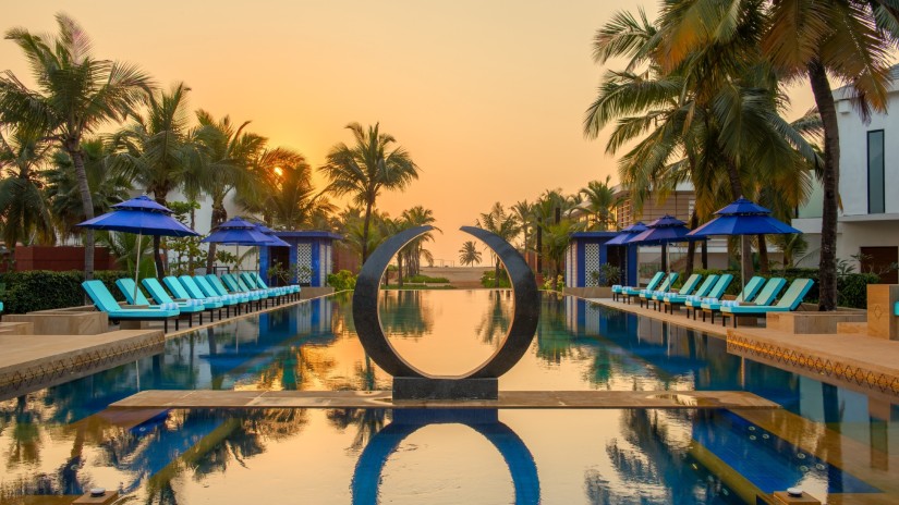 view of the swimming pool at Azaya, where you can enjoy an irresistible Prewedding photoshoot offer in Goa