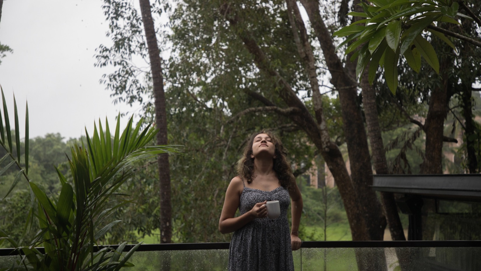 A woman looking at the sky