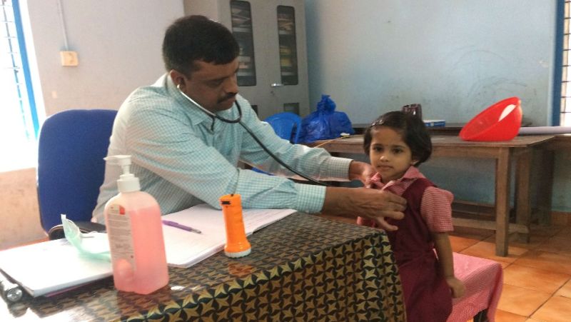 child getting check-up