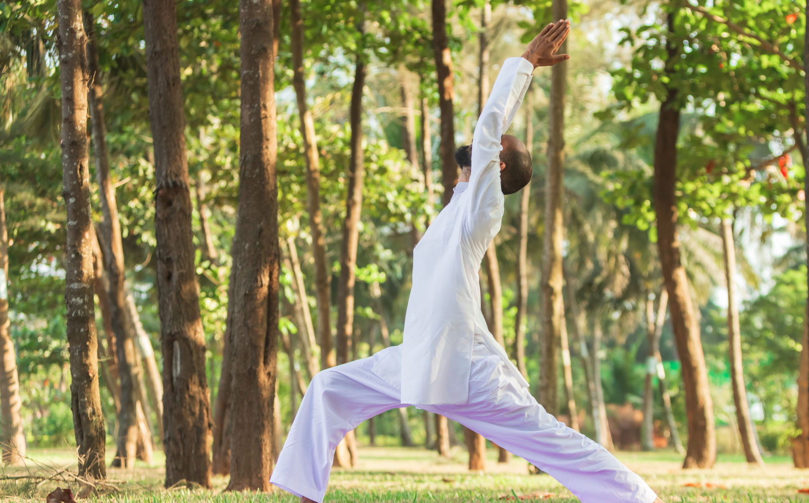 a person practising yoga at our wellness retreat in india