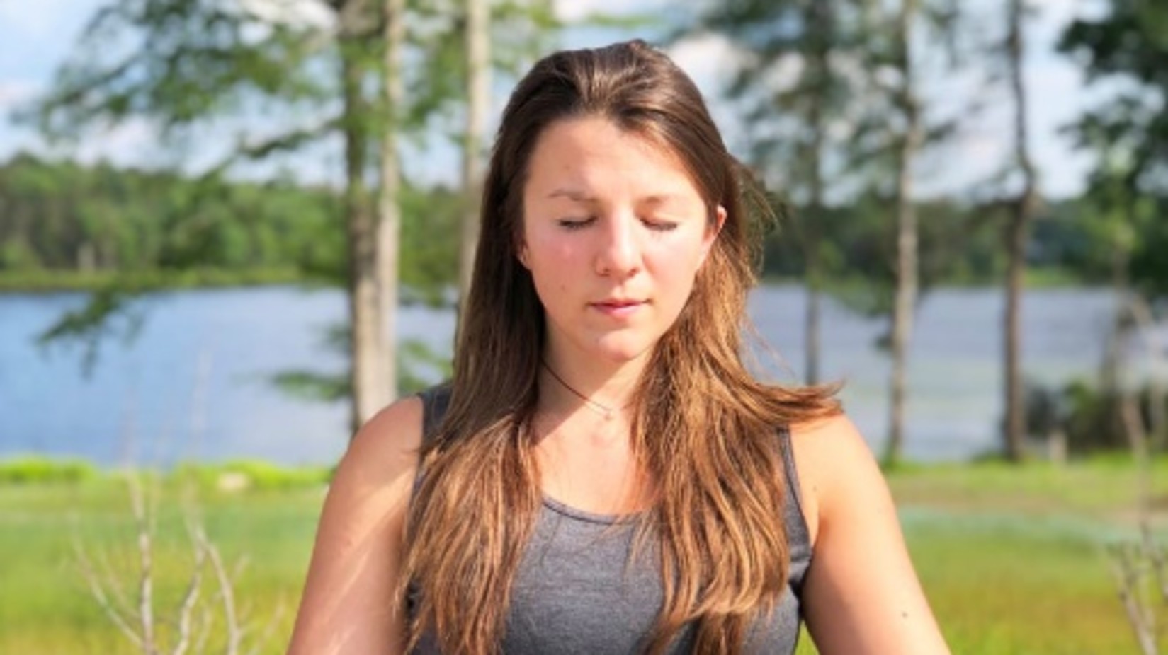 a woman doing yoga during daytime