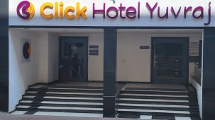 The front facade of Click Hotel Yuvraj with visible entrance and signage - Click hotels Yuvraj, Surat