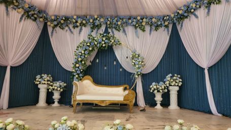 A beautiful weddings venue with a white sofa in the middle