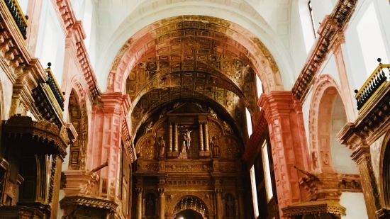 The interior of Basilica of Bom Jesus with an arch and wooden architecture