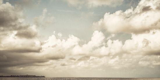 alt-text clouds over the sea