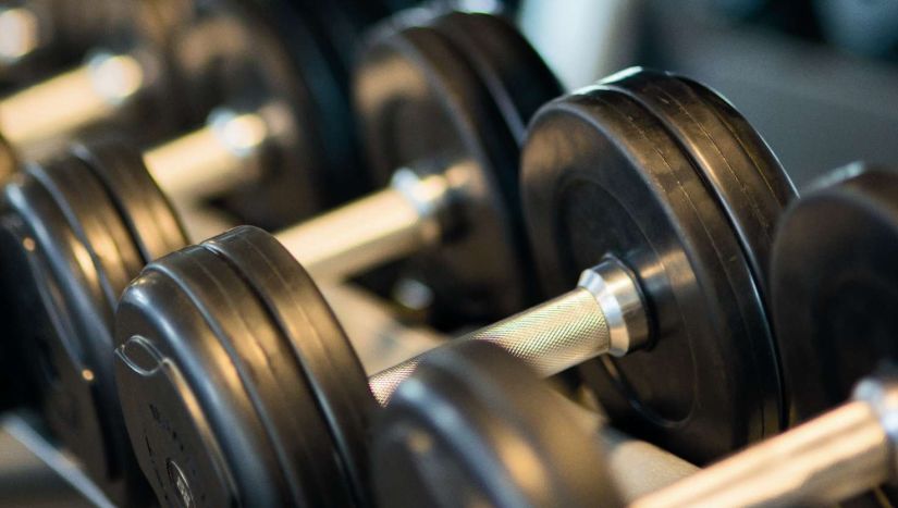 bodybuilding-close-up-dumbbells-260352