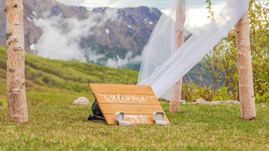 a wooden board with welcome written on it 