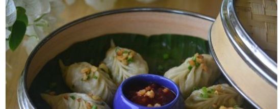 a excerpt from a newspaper about polo floatel kolkata that shows a box full of momos