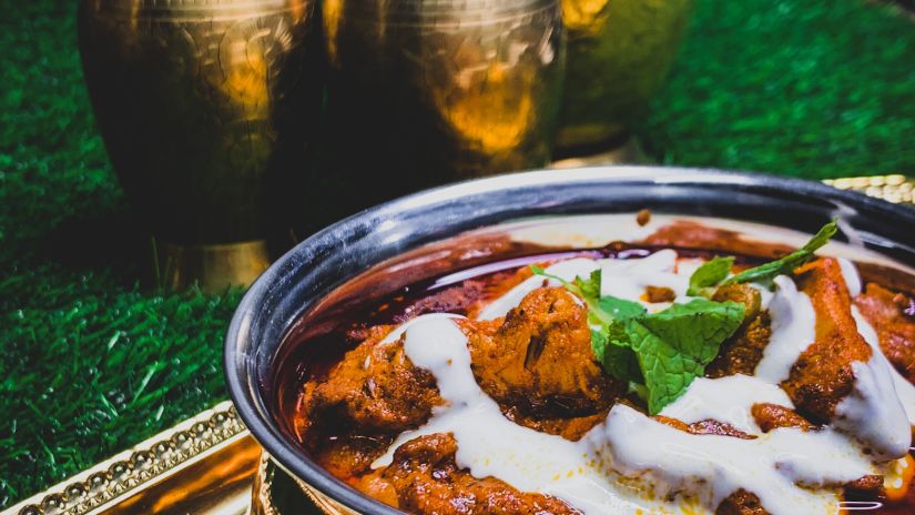 Chicken Ananrdana served in copper utensil