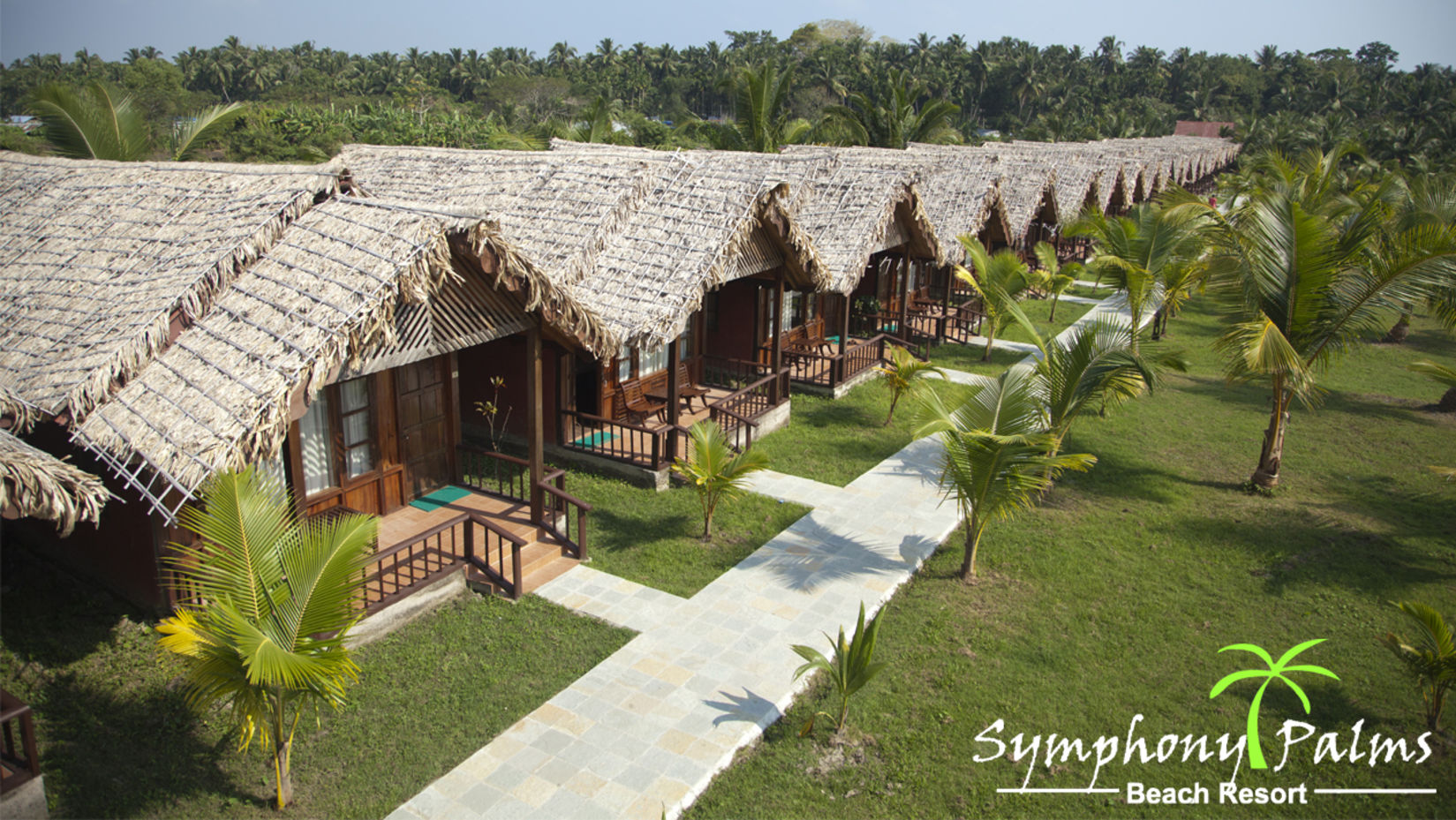 Cottages with thatched roof at Symphony resorts in Andaman