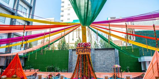 alt-text A low angle shot of a decorated event space beside the pool | Sun Park Hotel & Banquet, Chandigarh - Zirakpur