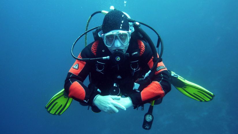 a person scuba diving underwater