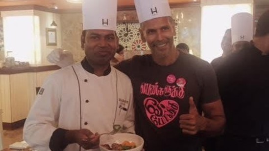 Chef Sathya and Milind Soman posing for a picture at Hablis Hotel, Chennai