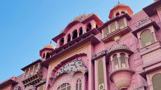 building made of red stone with carvings