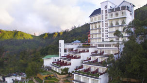 An aerial view of the grand facade of Fragrant Nature Munnar