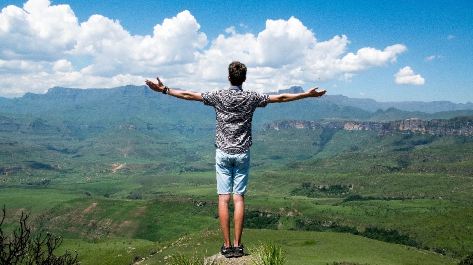 Man standing at the cliff