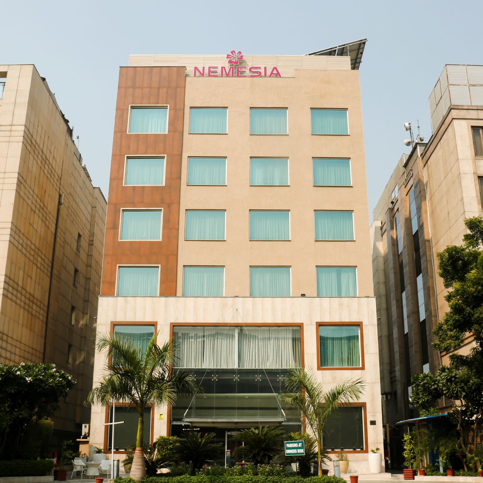 Facade of Nemesia Hotel in Guegaon 1