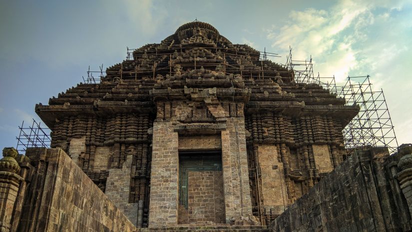 A low angle facade view of temple under renovation