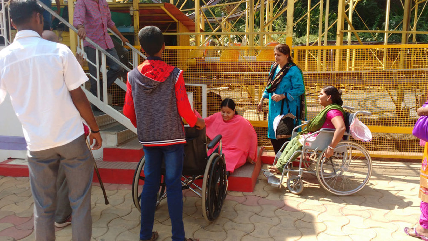 a group of people in wheelchairs during daytime